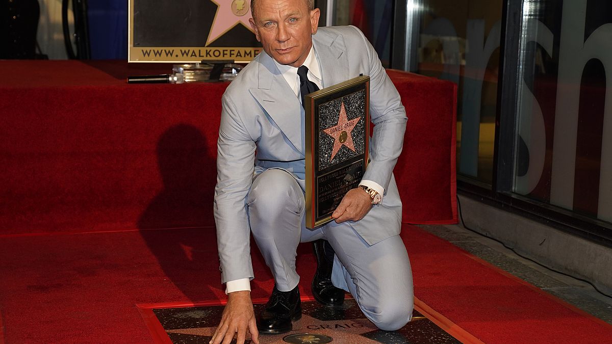 Daniel Craig con su estrella en el Paseo de la Fama