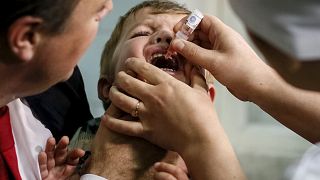 Stock picture: A boy receives polio vaccine drops at a clinic in Kyiv, Ukraine, October 21, 2015