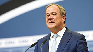 Christian Democratic Union party chairman Armin Laschet speaks to media at the party's headquarters in Berlin, Thursday, Oct. 7, 2021. 