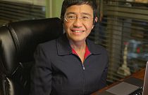 In this photo provided by the Rappler, Rappler CEO and Executive Editor Maria Ressa smiles at her home after being awarded the Nobel Peace Prize