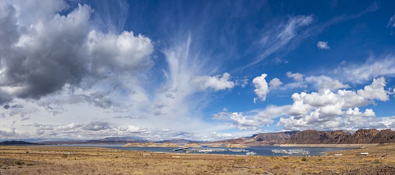 Lake Mead National Recreation Area and Marina with winter clouds and record low water level. Shot in 2021.