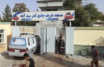 Blood stains the compound outside the mosque in Kunduz province.