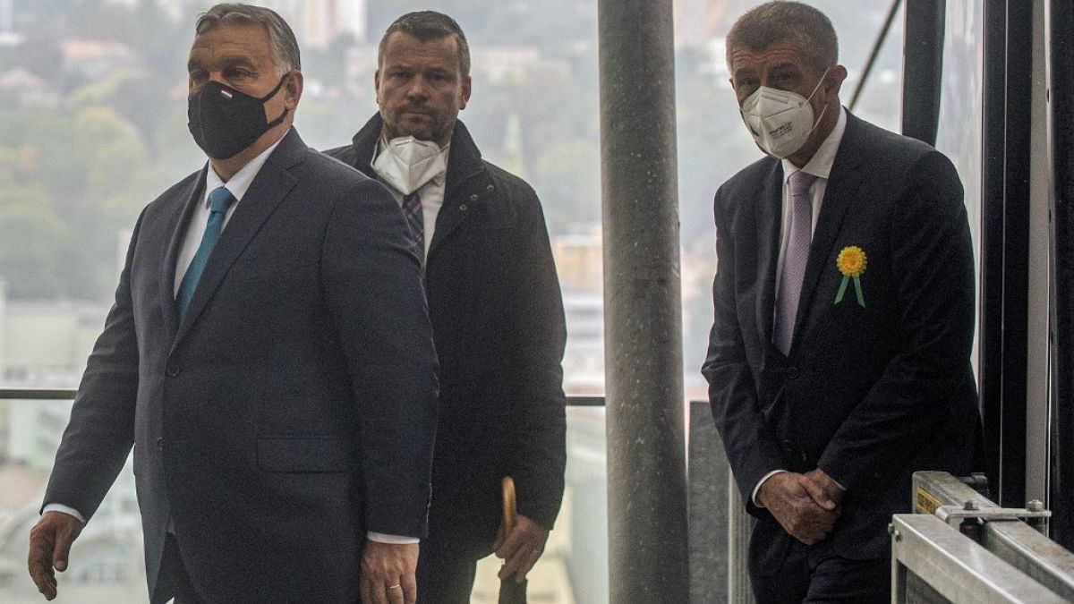 Czech Prime Minister Andrej Babis (R) and his Hungarian counterpart Viktor Orban (L) leave a cabin lift as they arrive for lunch at the Vetruse restaurant in Usti nad Labem.
