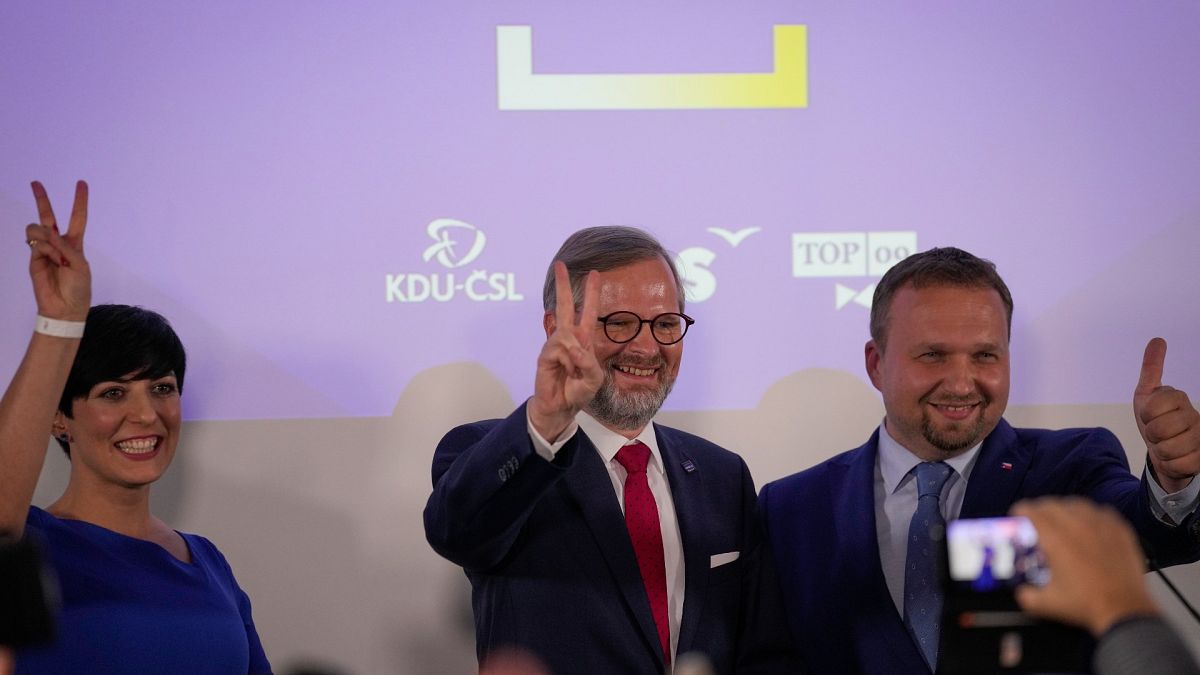 Leader of Spolu (Together) Petr Fiala, centre, at the party's headquarters after the country's parliamentary election, Prague, Czech Republic, Oct. 9, 2021. 
