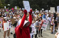 FILE - In this Oct. 2, 2021 - Women's March ATX rally, at the Texas State Capitol in Austin, Texas.