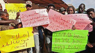 Libya: Migrants demand deportation to a safe place