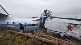 The wreckage at a site of the L-410 plane crash near the town of Menzelinsk in the Republic of Tatarstan, Russia, on on October 10, 2021.