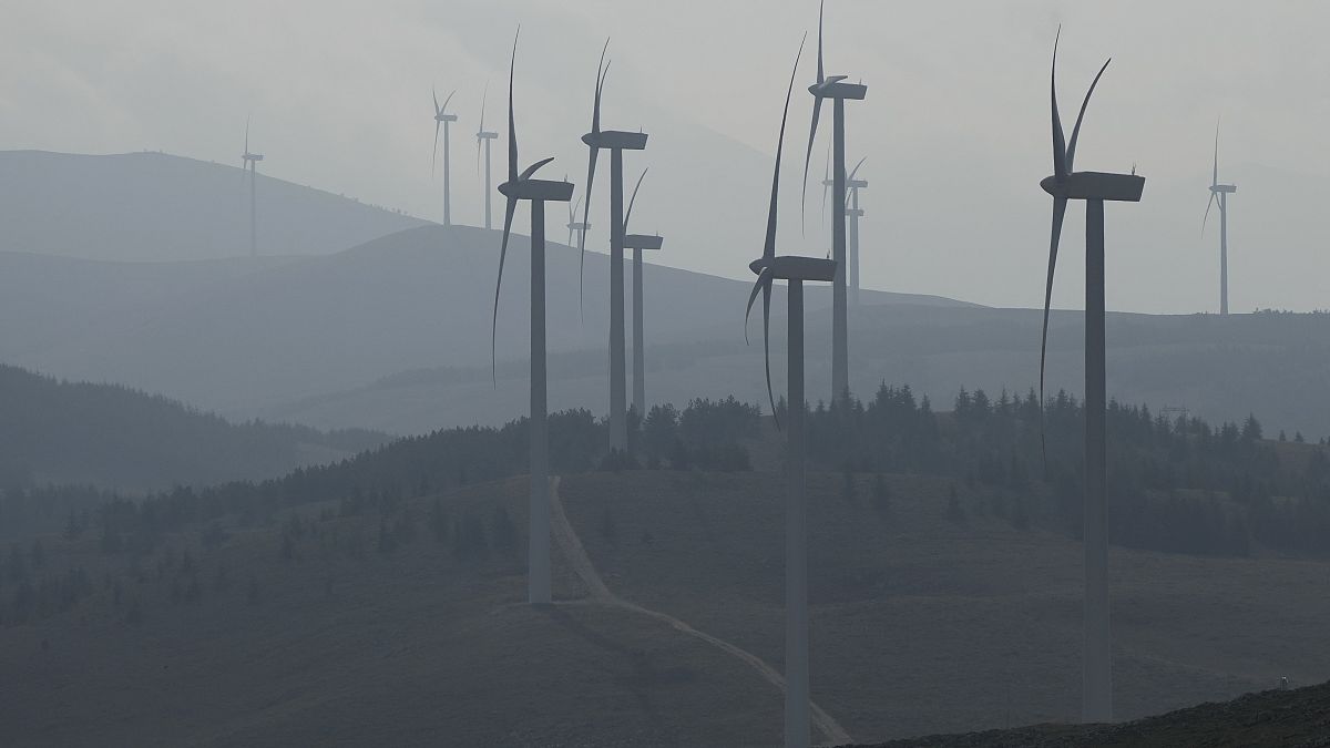 Wind turbines stand out at a wind farm in Collarmele, near L'Aquila, Thursday, Sept. 30, 2021.