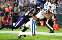 Indianapolis Colts wide receiver Michael Pittman (11) leans for a touchdown with Baltimore Ravens cornerback Marlon Humphrey (44) on his back