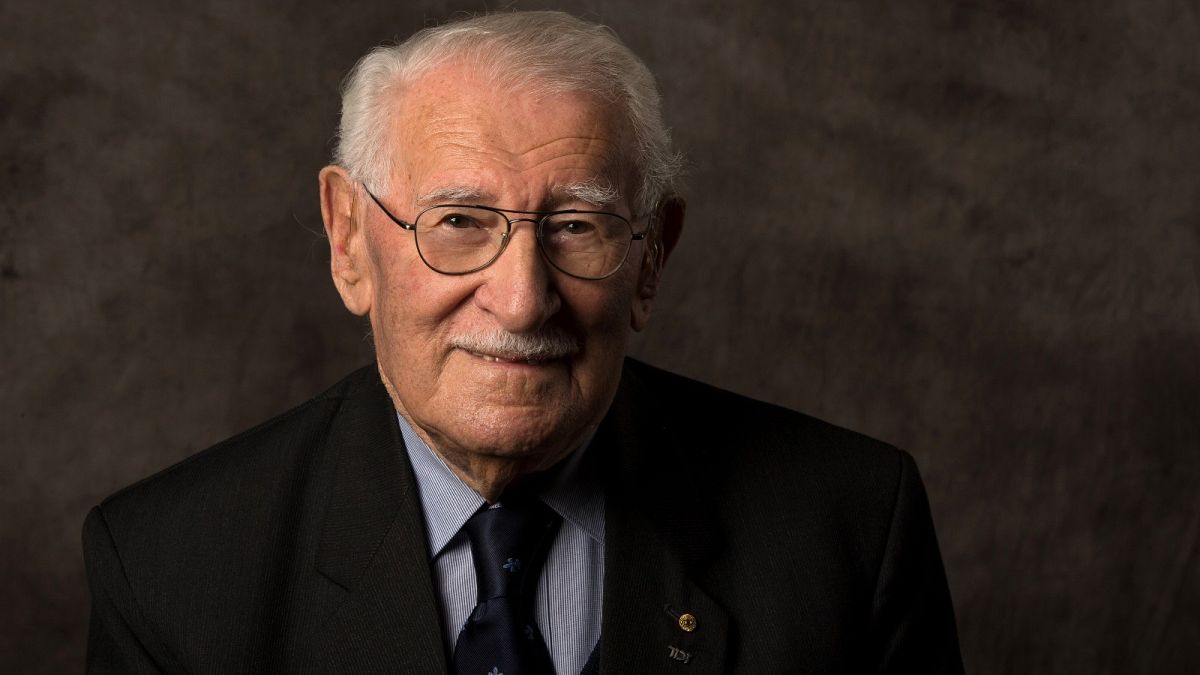 In this undated photo provided by the Sydney Jewish Museum, Holocaust survivor Eddie Jaku poses for a photograph in Sydney, Australia