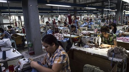 Seamstresses work at a garment factory in Yangon.