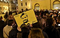 Amnesty International activists hold a picture of Giulio Regeni during a demonstration in front of the Italian Parliament in January 2017.