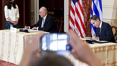 Secretary of State Antony Blinken and Greece's Foreign Minister Nikos Dendias sign the renewal of the U.S.-Greece Mutual Defense Cooperation Agreement at the State Department 