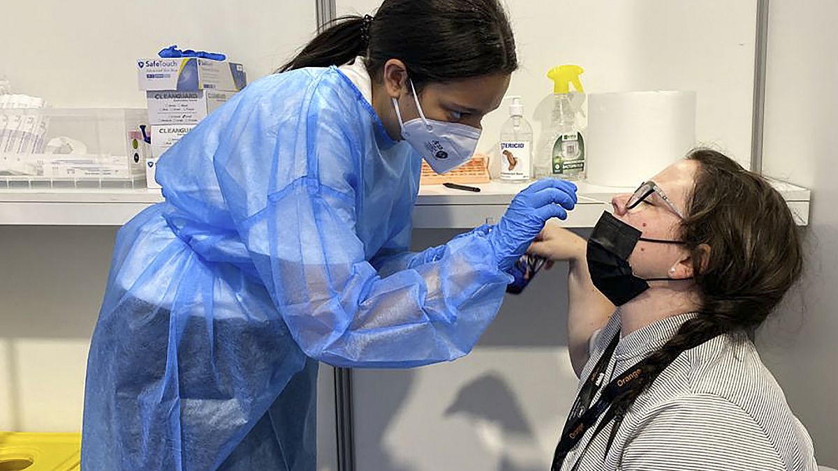 AP photographer Brynn Anderson receives a coronavirus test before resuming work at the Cannes Film Festival on Monday, July 12, 2021, in Cannes, southern France.