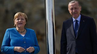 German Chancellor Angela Merkel, left, is welcomed by Turkish President Recep Tayyip Erdogan on the occasion of their meeting at Huber Villa presidential palace, in Istanbul.