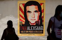 ملصق كتب عليه "الحرية لأليكس صعب" - كاراكاس