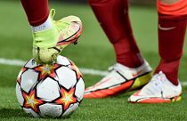 A Liverpool player puts his foot on the ball during the Champions League Group B soccer match / FILE PHOTO