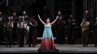 Russian soprano Anna Netrebko acknowledges the applause of the audience at the end of La Scala opera house's gala season opener, Italy, Saturday, Dec. 7, 2019. 