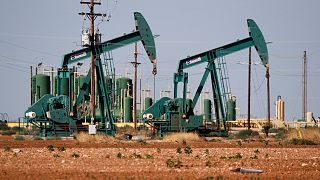 In this Wednesday, July 29, 2020 file photo, a view of a pump jack operateing in an oil field in Midland, Texas.