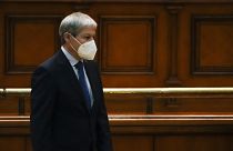 Romanian Prime Minister designate Dacian Ciolos stands before a parliament session on Wednesday.