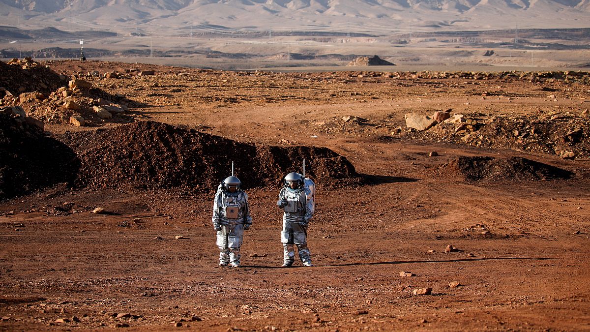 Scientists participate in an experiment led by Austrian and Israeli space agencies simulating a mission to Mars in Negev desert, Israel, October 10, 2021.