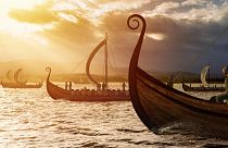 A depiction of Viking ships on the water.