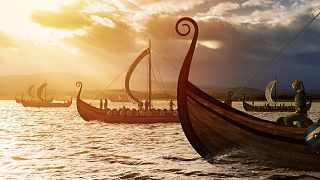 A depiction of Viking ships on the water.
