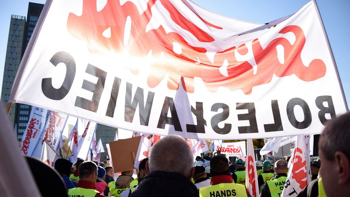 Solidarnosc union activists held banners at the protest in Luxembourg.