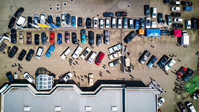 Vehicles parked near a building in Germany