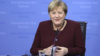 German Chancellor Angela Merkel speaks during a media conference at an EU summit in Brussels, Friday, Oct. 22, 2021.