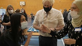 British Prime Minister Boris Johnson as he visits a COVID-19 vaccination centre at Little Venice Sports Centre, in London, Oct. 22, 2021.