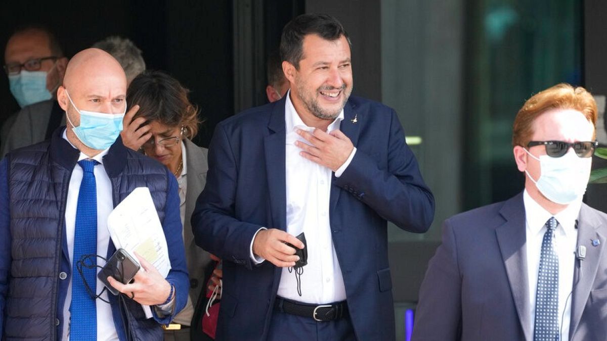 Former minister of interior Matteo Salvini, center, leaves the Palermo's court, Italy, Saturday, Oct. 23, 2021.
