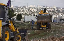 کارگران اسرائیلی در یک پروژه شهرک‌سازی در کرانه باختری رود اردن