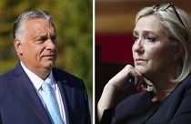 Hungarian Prime Minister Viktor Orban (L), and Marine Le Pen, leader of the French far-right Rassemblement National.