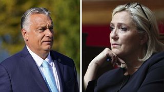 Hungarian Prime Minister Viktor Orban (L), and Marine Le Pen, leader of the French far-right Rassemblement National.