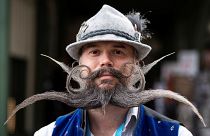 Participant, Christian Feicht from Germany poses at the World Moustache and Beard Championships 2021 in Eging am See, Germany, October 23, 2021.