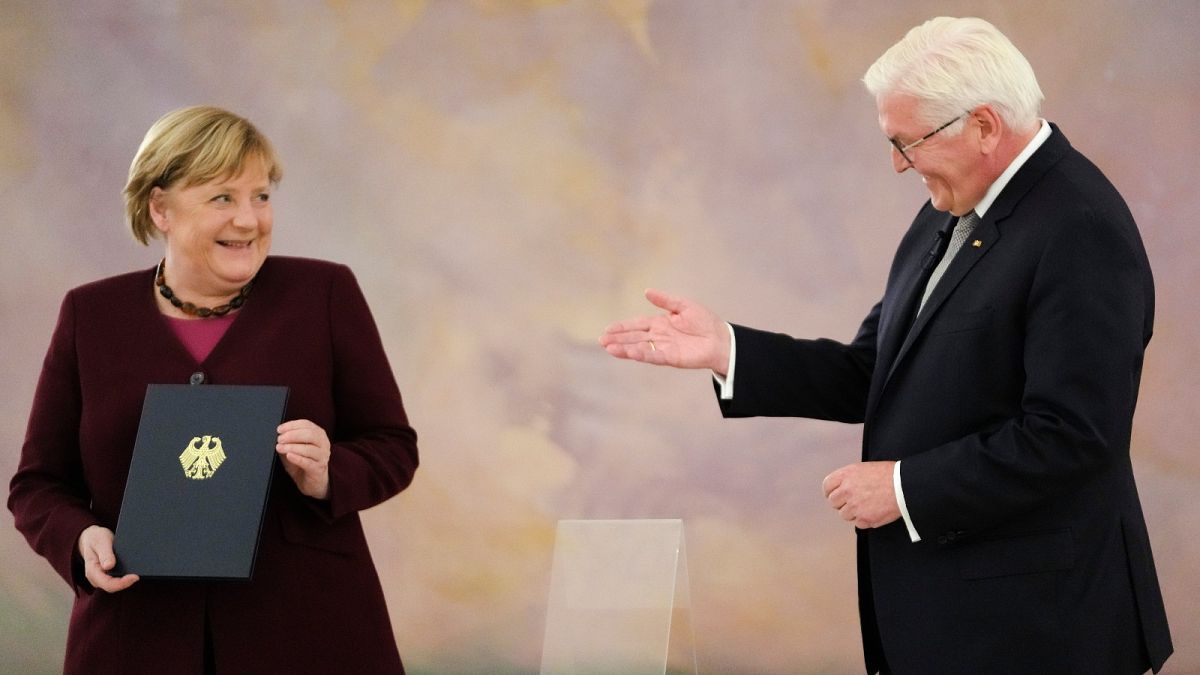 Angela Merkel received her formal dismissal certificate from the post of chancellor after 16 years in office.