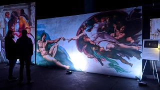 A replica of 'The Creation of Adam' within the Sistine Chapel of Tottenham
