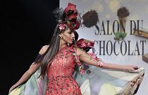 A Venezuelan model presents a creation made with chocolate during the Chocolate Fair (Salon du Chocolat) in Paris on October 28, 2021.
