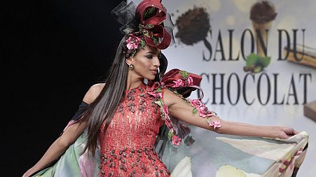 A Venezuelan model presents a creation made with chocolate during the Chocolate Fair (Salon du Chocolat) in Paris on October 28, 2021.