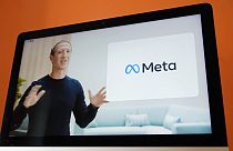 Seen on the screen of a device in Sausalito, Calif., Facebook CEO Mark Zuckerberg announces their new name, Meta