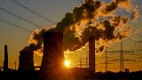 Steam comes out of the chimneys of the coal-fired power station in Niederaussem, Germany, Oct. 24, 2021.