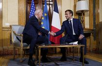 U.S. President Joe Biden, left, shakes hands with French President Emmanuel Macron during a meeting at La Villa Bonaparte in Rome, Friday, Oct. 29, 2021.