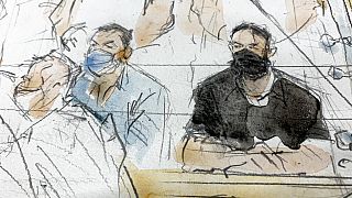 Sept.8, 2021 file sketch shows key defendant Salah Abdeslam, right, and Mohammed Abrini in the special courtroom built for the 2015 attacks trial.