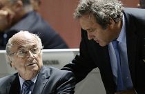 FIFA President Sepp Blatter, left, and UEFA President Michel Platini are engaged in conversation during the 65th FIFA Congress in Zurich, Switzerland, May 29, 2015.