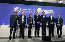Colombian President Duque (second from right) poses for a 'family photo' at COP26.