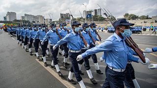 FILE - Ethiopian police march during a parade to display new police uniforms and instruct them to maintain impartiality.