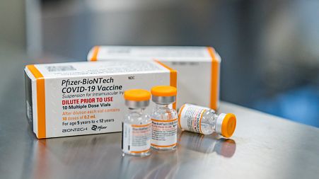 This October 2021, photo provided by Pfizer shows kid-size doses of its COVID-19 vaccine in Puurs, Belgium.