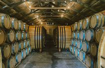 Barrels of Neldner Road single-vineyard wines, which are being offered as individual NFTs on OpenSea