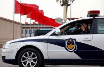 Aracın içinden fotoğraf çeken Çin polisi